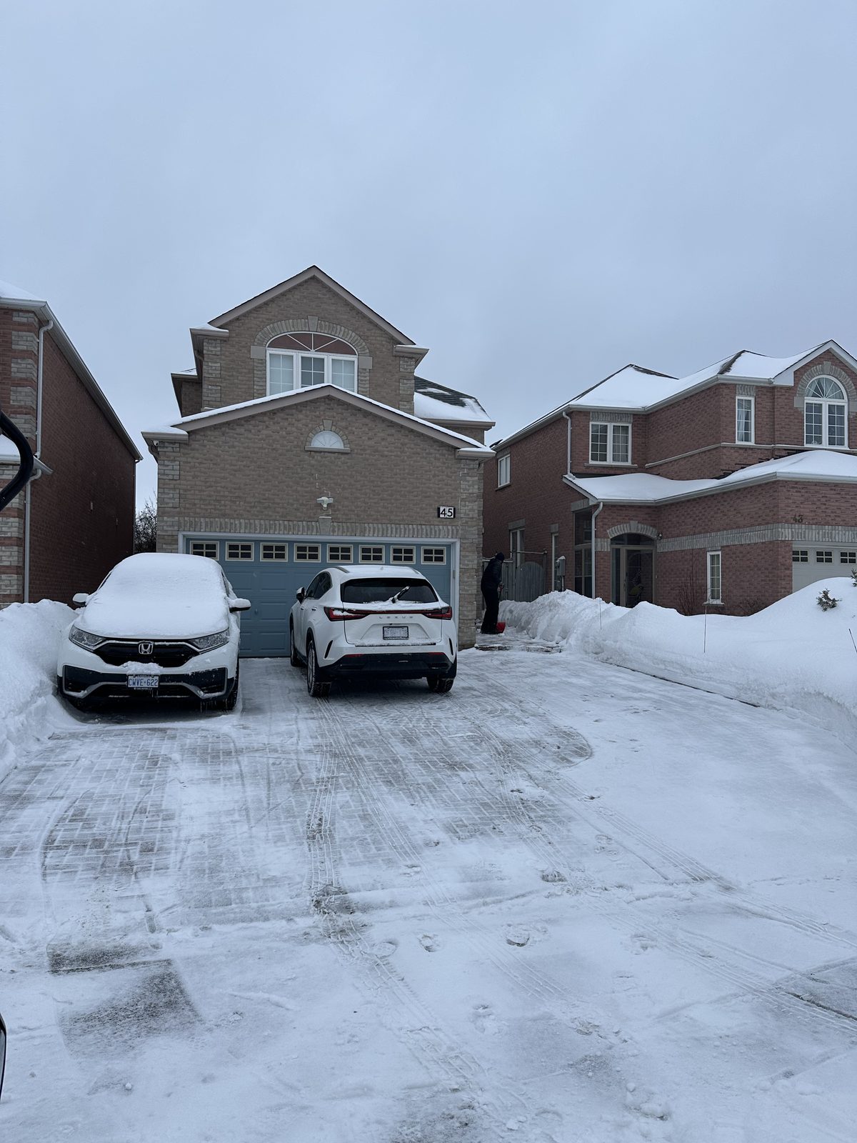 Shoveling snowy driveway